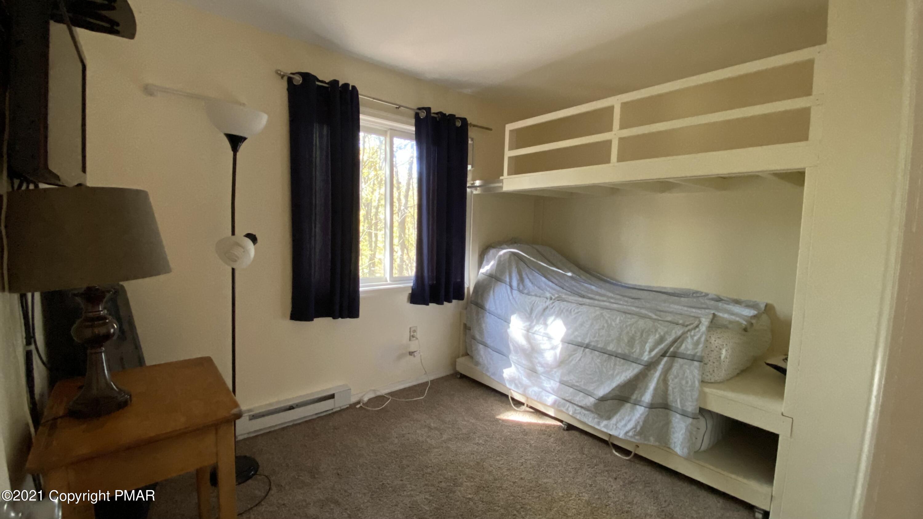 6148 Decker Road Bushkill, PA 18324 - Photo 22 of 36 a view of an empty room with a window