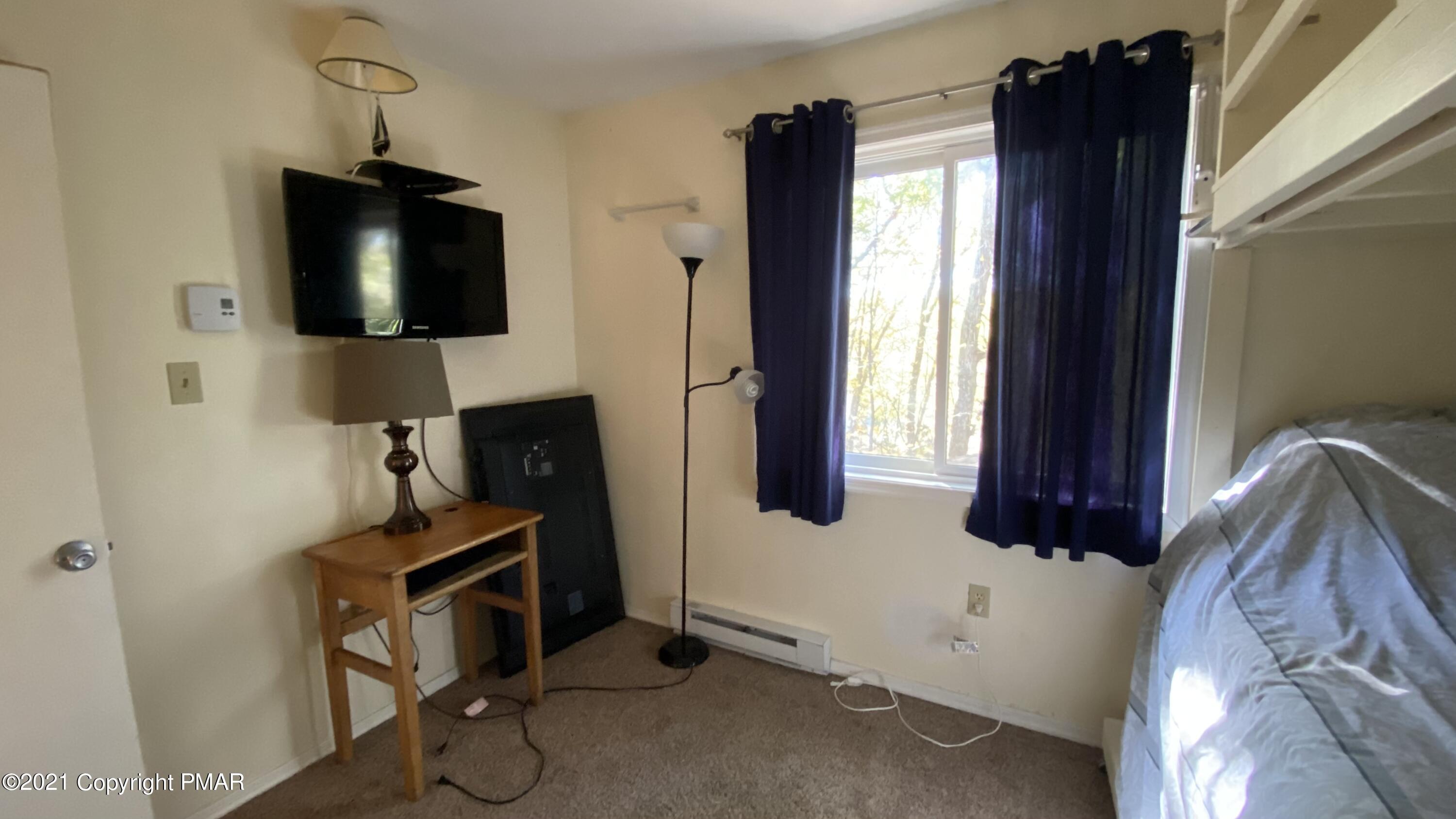 6148 Decker Road Bushkill, PA 18324 - Photo 24 of 36 a view of a livingroom with furniture and a window