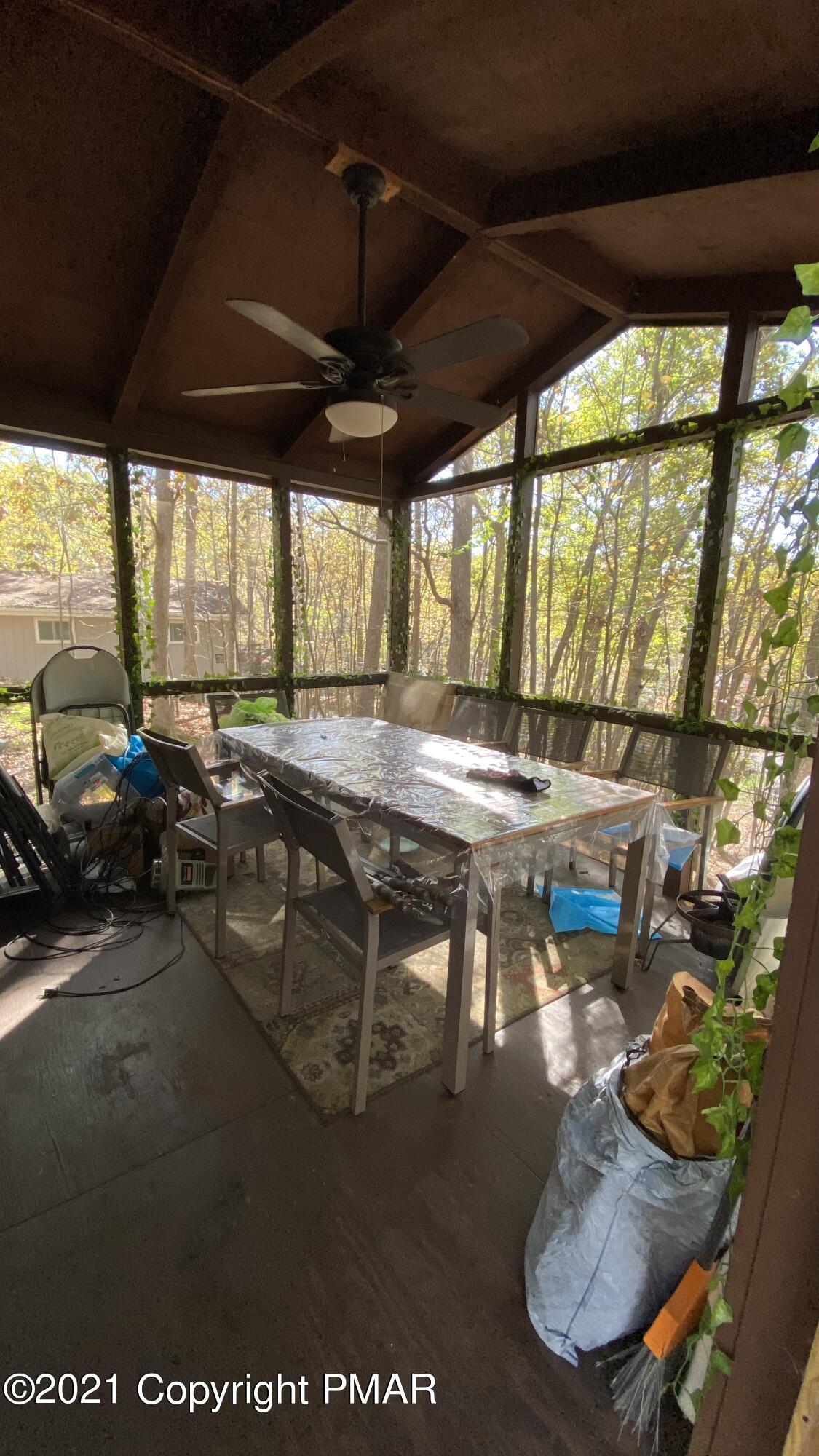 6148 Decker Road Bushkill, PA 18324 - Photo 36 of 36 a view of a dining room with furniture window and outside view