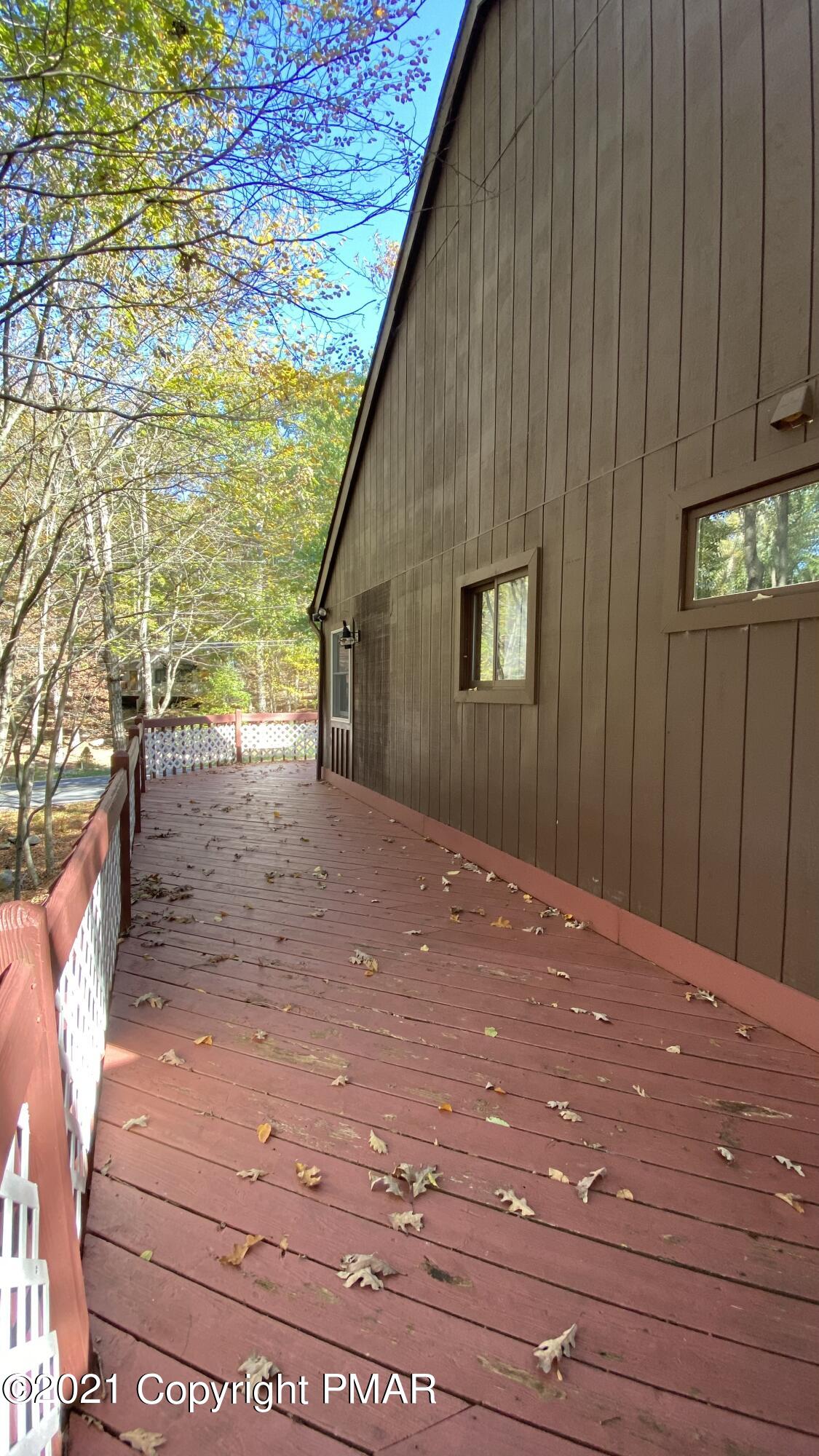 6148 Decker Road Bushkill, PA 18324 - Photo 5 of 36 a view of backyard with hardwood