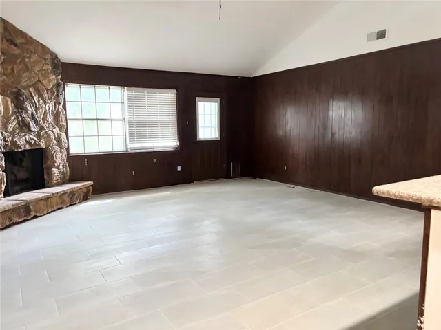 an empty room with windows