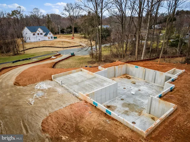 a view of swimming pool with a patio