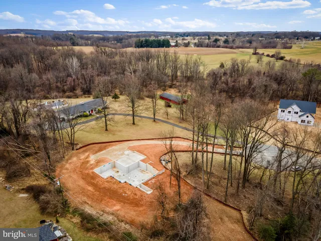 a view of a swimming pool with a lake view