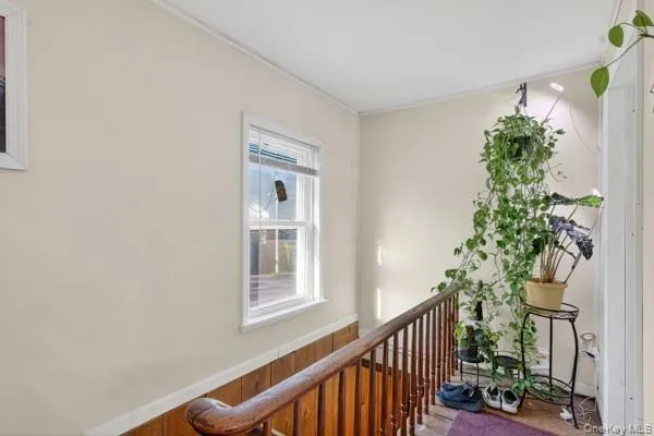a view of balcony with furniture