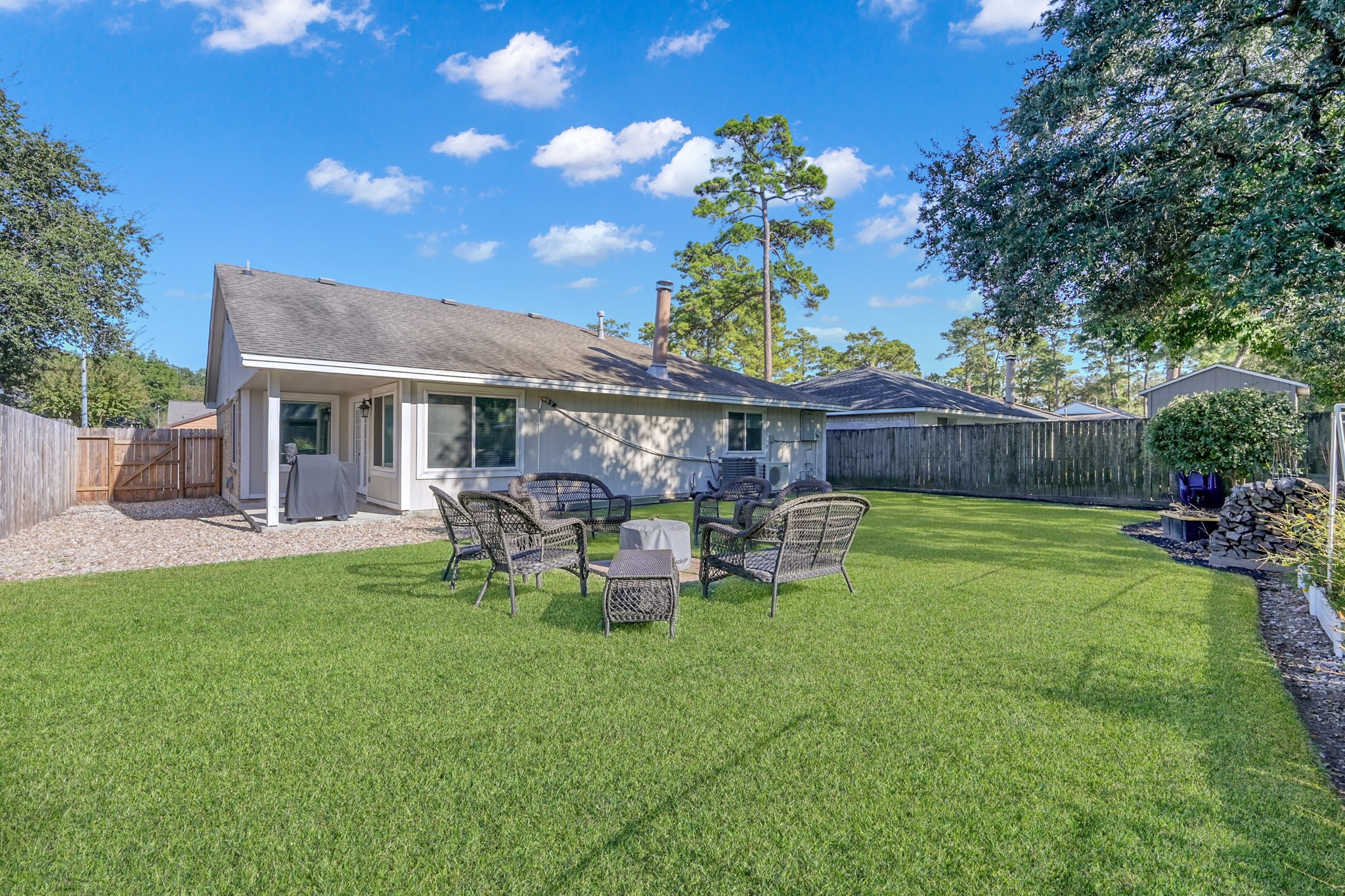 17323 Lowick Street Spring, TX 77379 - Photo 15 of 21 Huge backyard with lush landscaping.