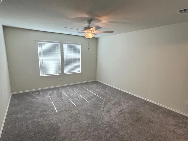 a view of kitchen and windows