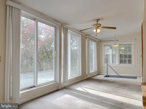 a room with furniture and a window