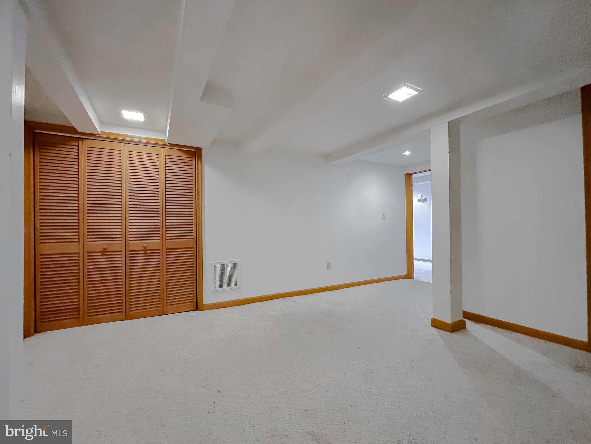 43979 Drum Cliff Road Hollywood, MD 20636 - Photo 25 of 57 a view of an empty room with a window