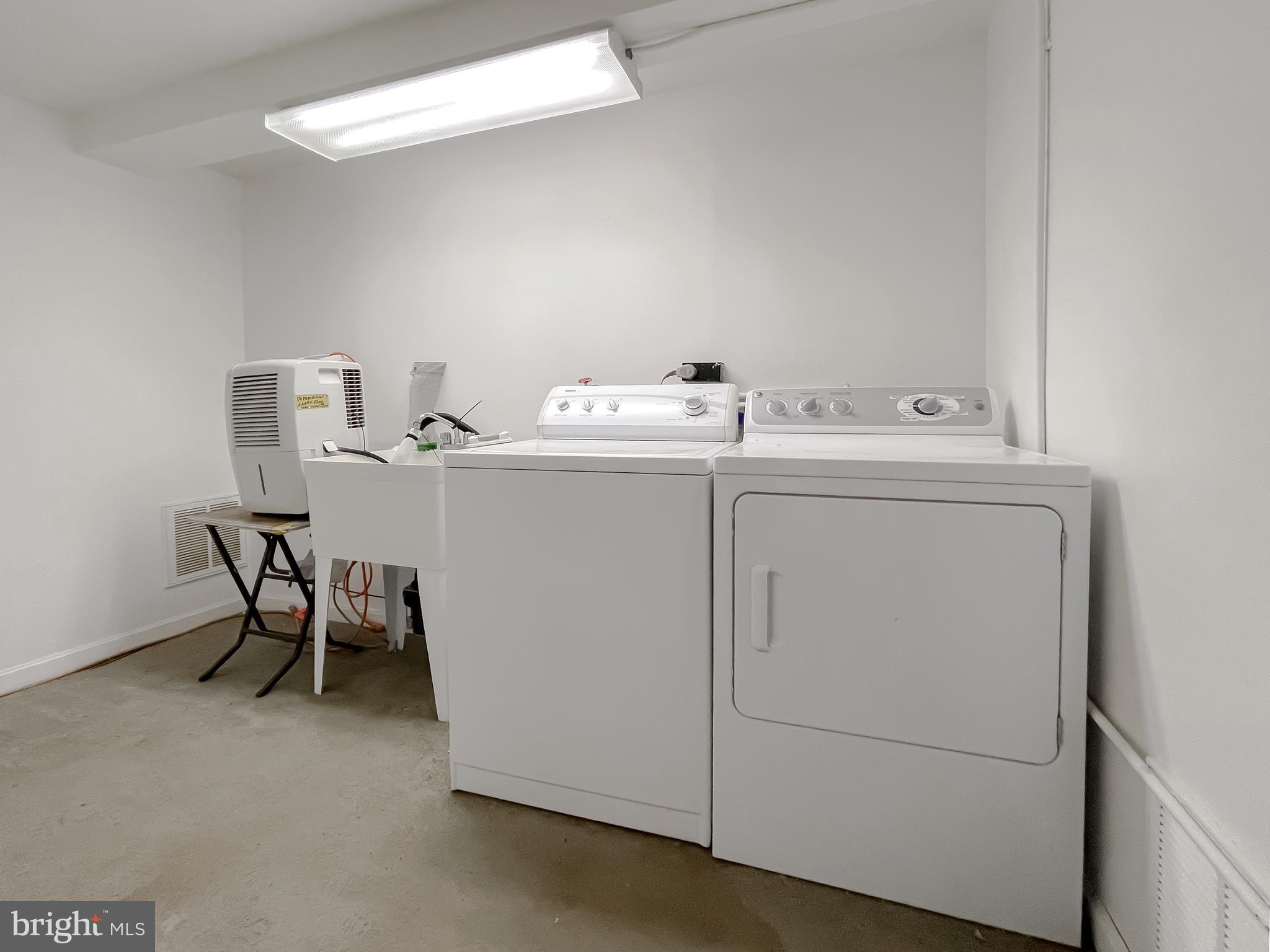 43979 Drum Cliff Road Hollywood, MD 20636 - Photo 26 of 57 a utility room with dryer and washer