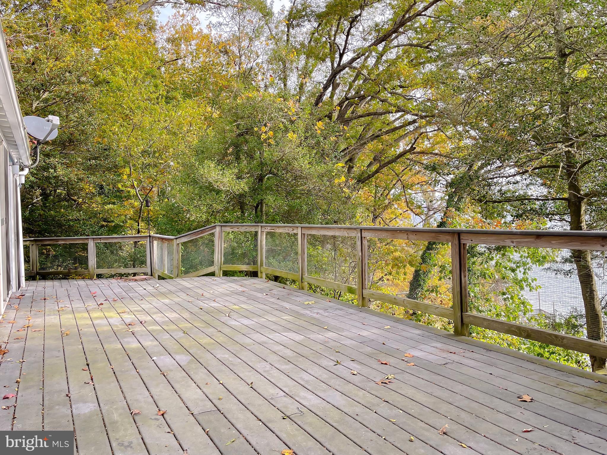 43979 Drum Cliff Road Hollywood, MD 20636 - Photo 33 of 57 a view of wooden deck and a garden