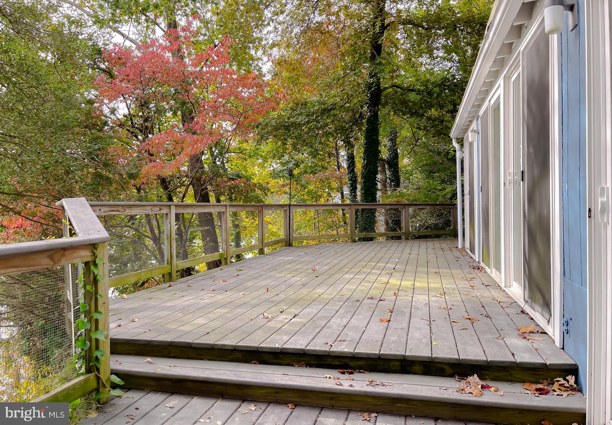 43979 Drum Cliff Road Hollywood, MD 20636 - Photo 35 of 57 a view of roof deck with wooden floor and seating space