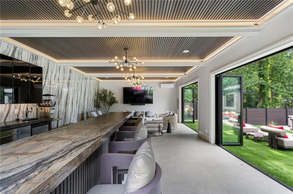 1386 Moores Mill Road Northwest Atlanta, GA 30327 - Photo 22 of 57 a outdoor space with furniture