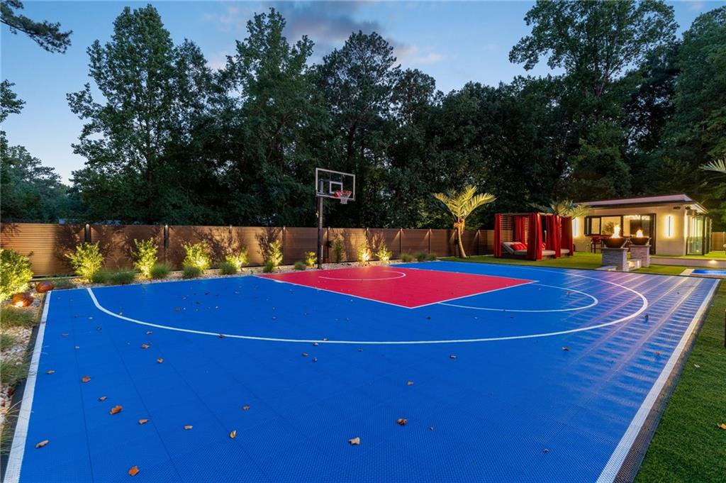 1386 Moores Mill Road Northwest Atlanta, GA 30327 - Photo 25 of 57 a view of a tennis court