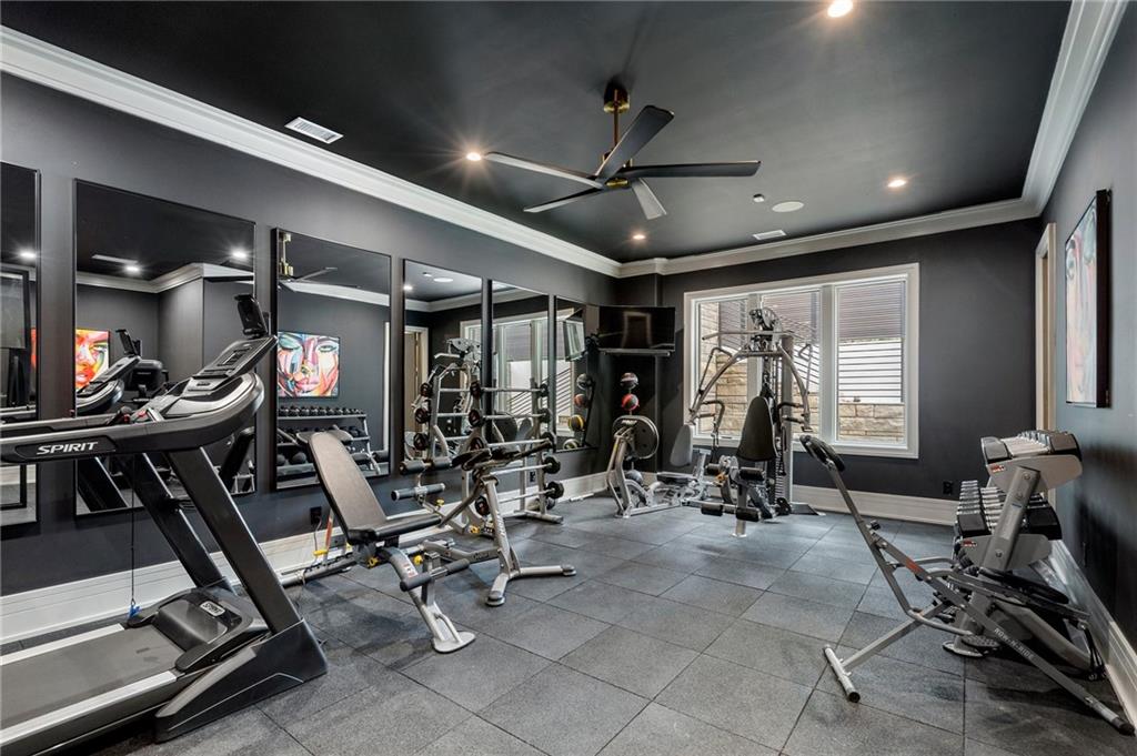 1386 Moores Mill Road Northwest Atlanta, GA 30327 - Photo 31 of 57 a view of a room with gym equipment