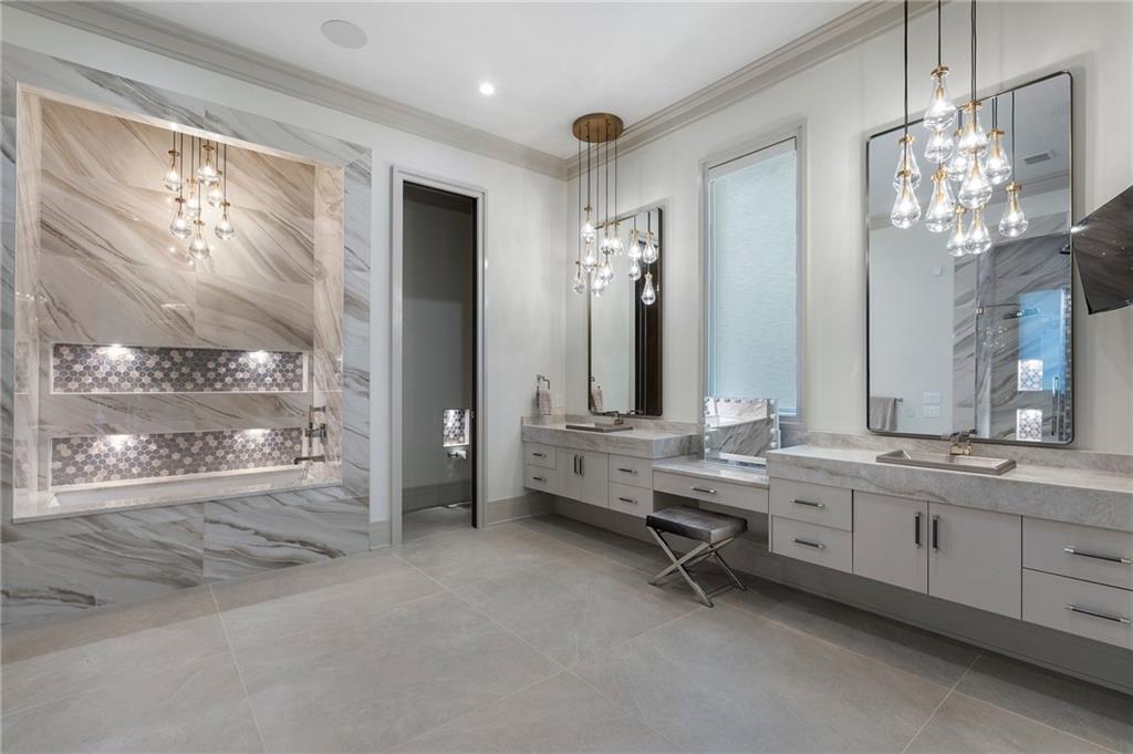 1386 Moores Mill Road Northwest Atlanta, GA 30327 - Photo 45 of 57 a large living room with a large window