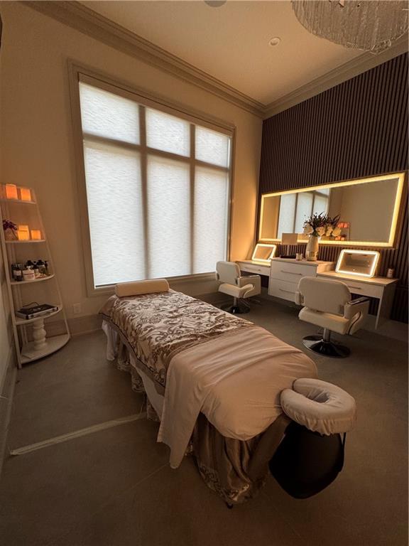 1386 Moores Mill Road Northwest Atlanta, GA 30327 - Photo 49 of 57 a bedroom with a bed and a window