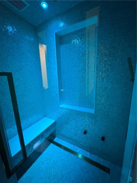 1386 Moores Mill Road Northwest Atlanta, GA 30327 - Photo 50 of 57 a bathroom with a shower