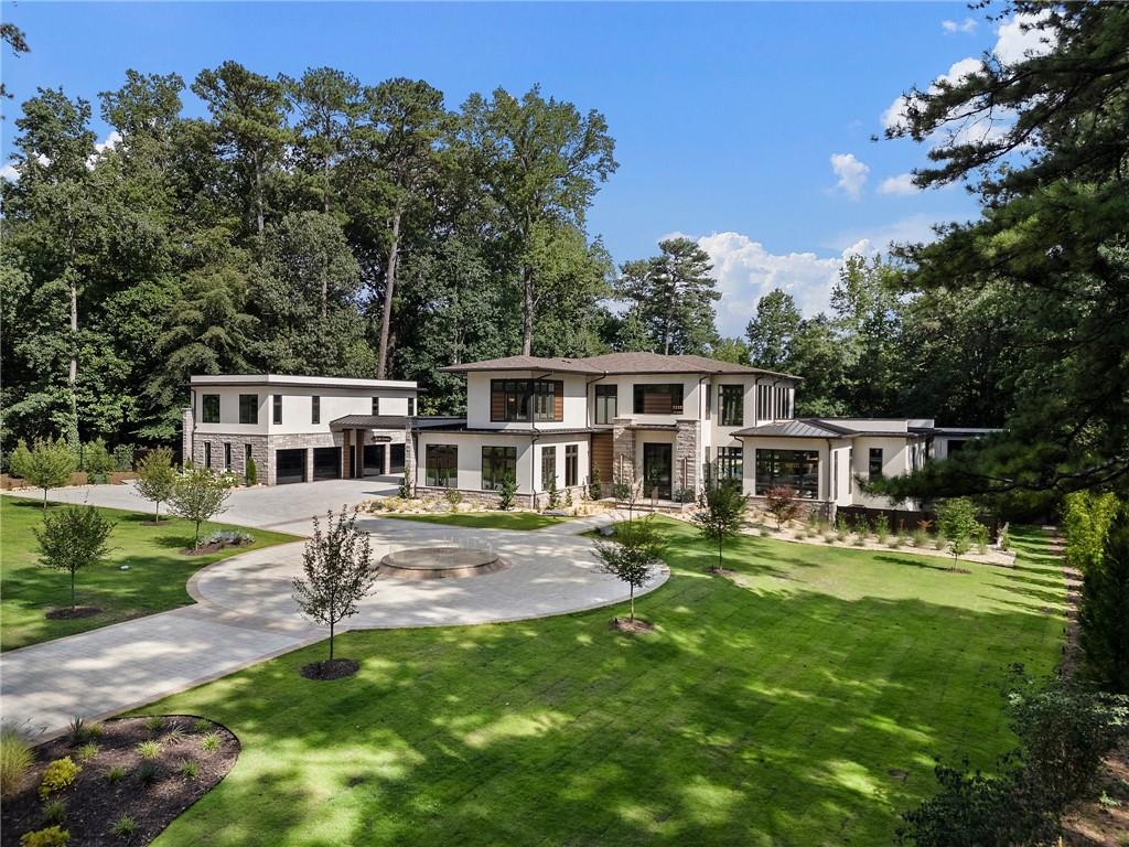 1386 Moores Mill Road Northwest Atlanta, GA 30327 - Photo 57 of 57 front view of house with a yard