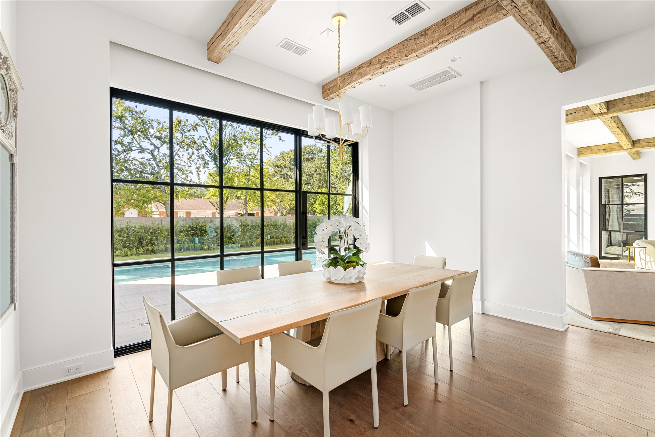811 Creek Wood Way Houston, TX 77024 - Photo 12 of 49 a view of a dining room with furniture window and wooden floor