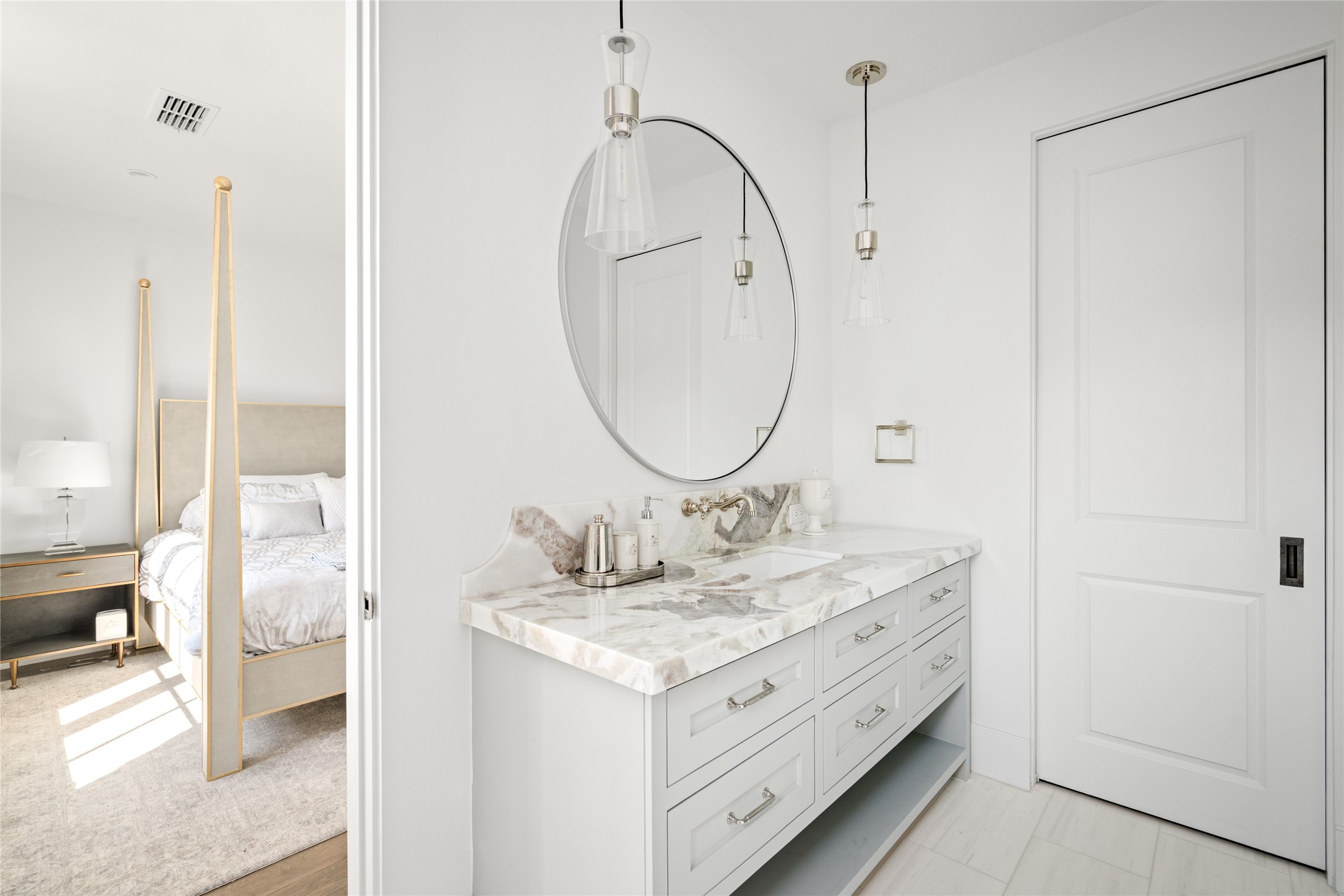 811 Creek Wood Way Houston, TX 77024 - Photo 24 of 49 a bathroom with a granite countertop sink a mirror and a shower