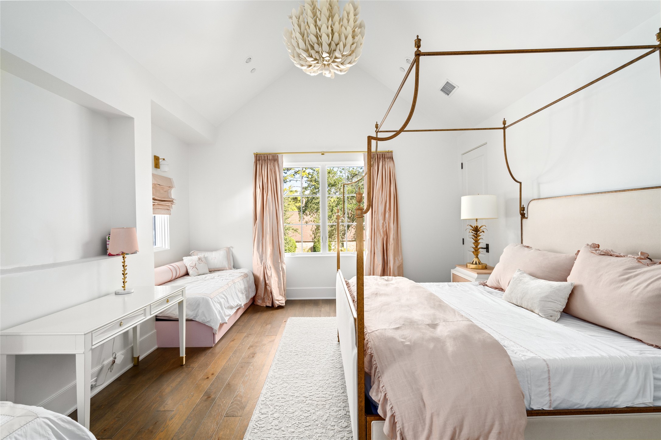 811 Creek Wood Way Houston, TX 77024 - Photo 25 of 49 a bedroom with bed and a window