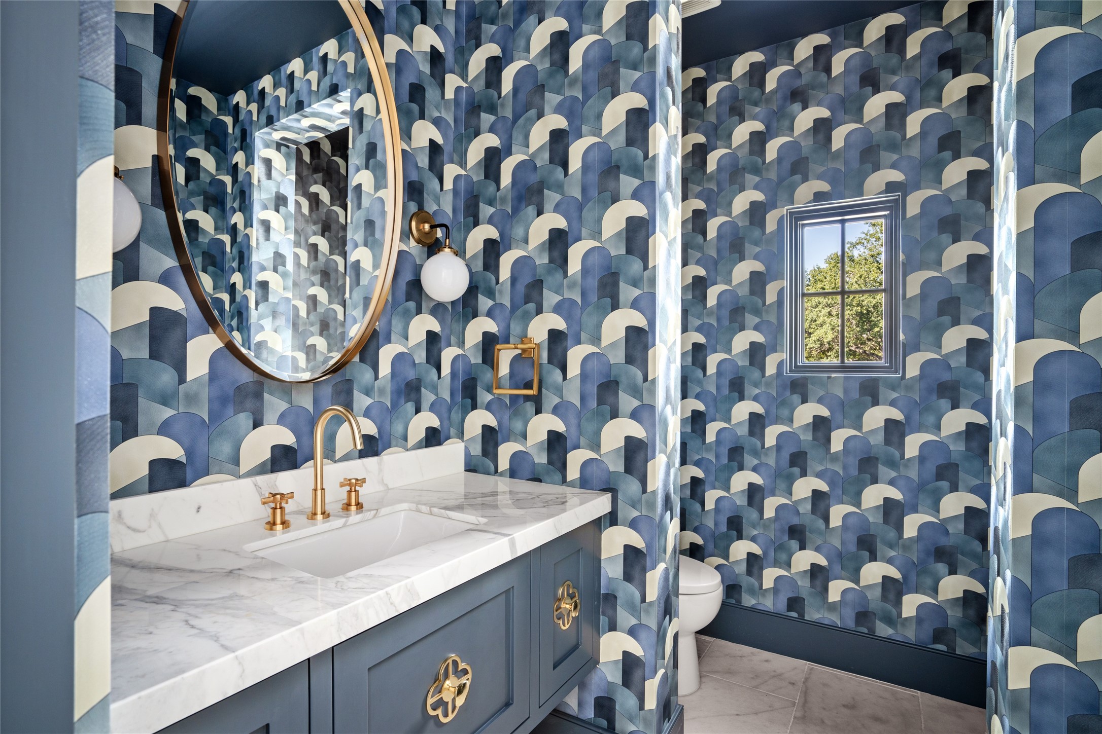 811 Creek Wood Way Houston, TX 77024 - Photo 29 of 49 a bathroom with a sink mirror and vanity