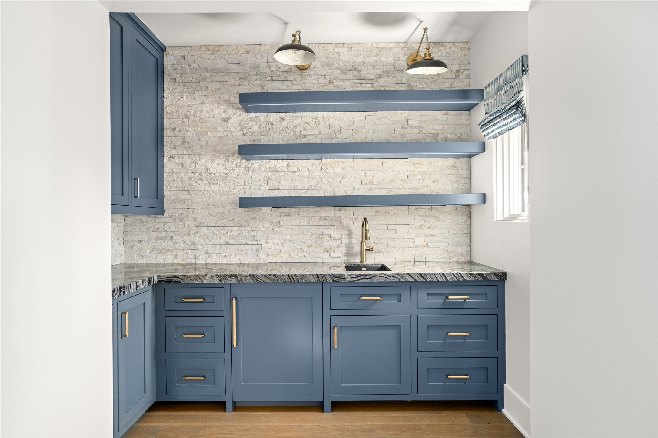 811 Creek Wood Way Houston, TX 77024 - Photo 31 of 49 a view of a sink and cabinets