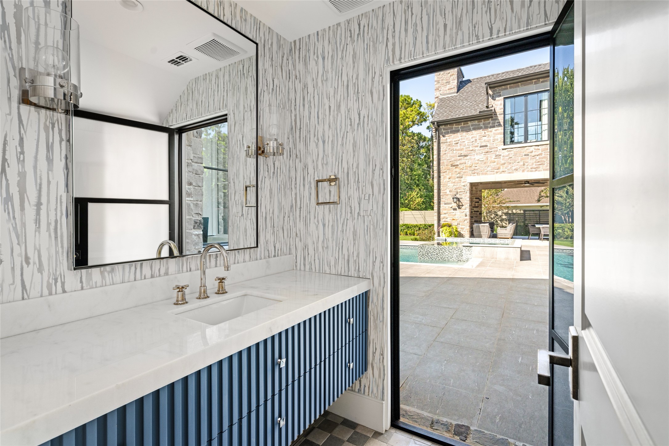 811 Creek Wood Way Houston, TX 77024 - Photo 38 of 49 a bathroom with a double vanity sink mirror and shower