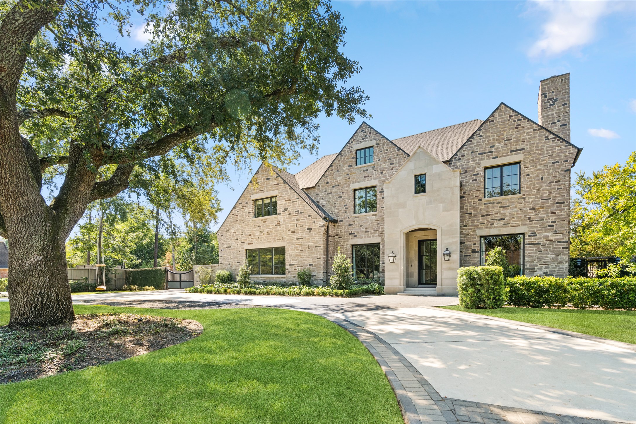 811 Creek Wood Way Houston, TX 77024 - Photo 49 of 49 a front view of a house with a yard