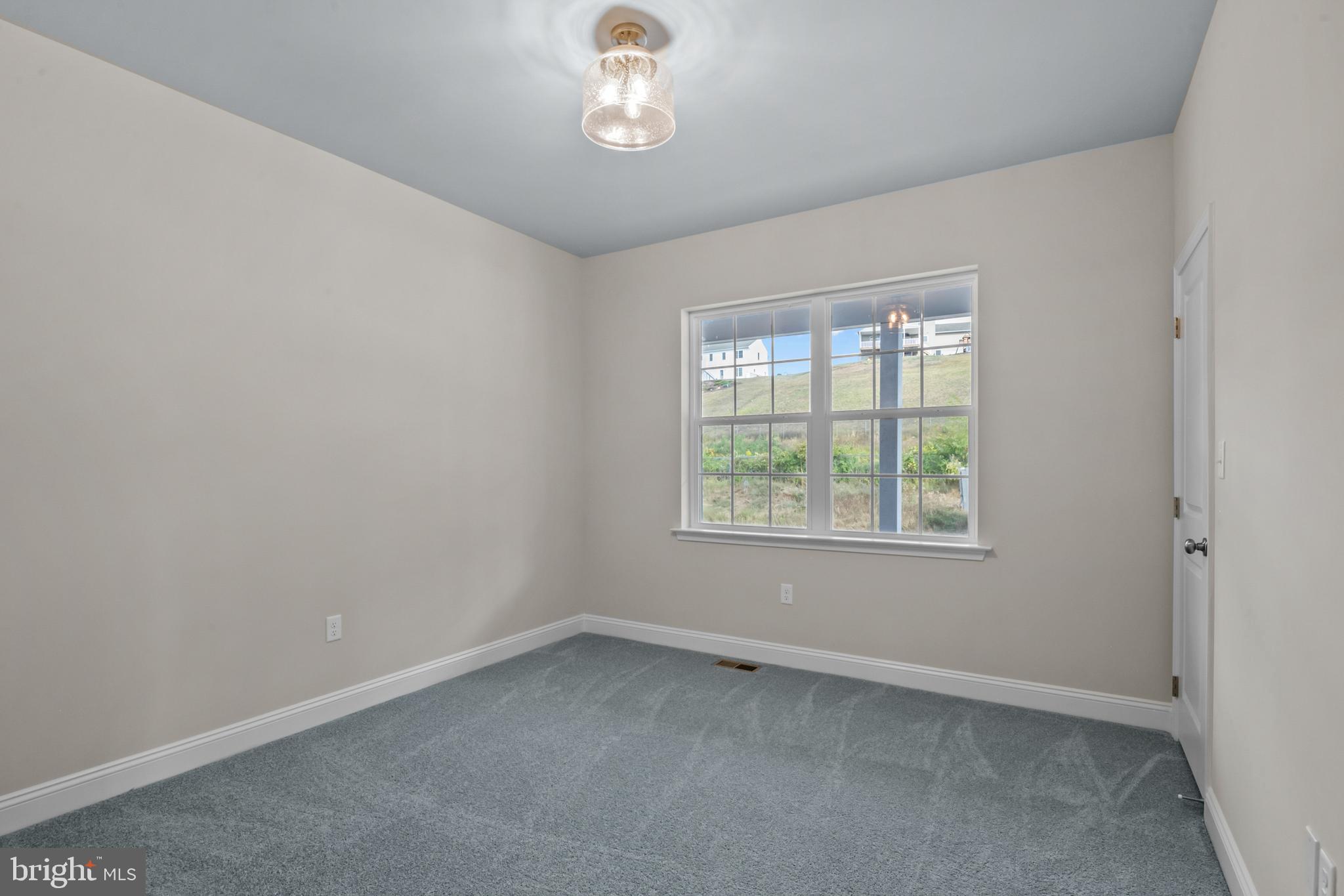 8 Country Club Road Ashland, PA 17921 - Photo 12 of 18 an empty room with a window