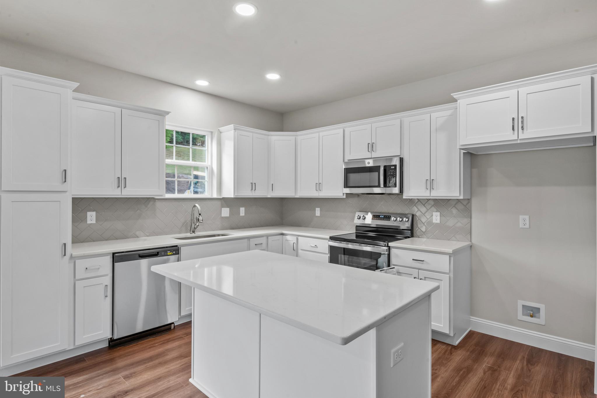 8 Country Club Road Ashland, PA 17921 - Photo 4 of 18 a kitchen with a sink stove and refrigerator