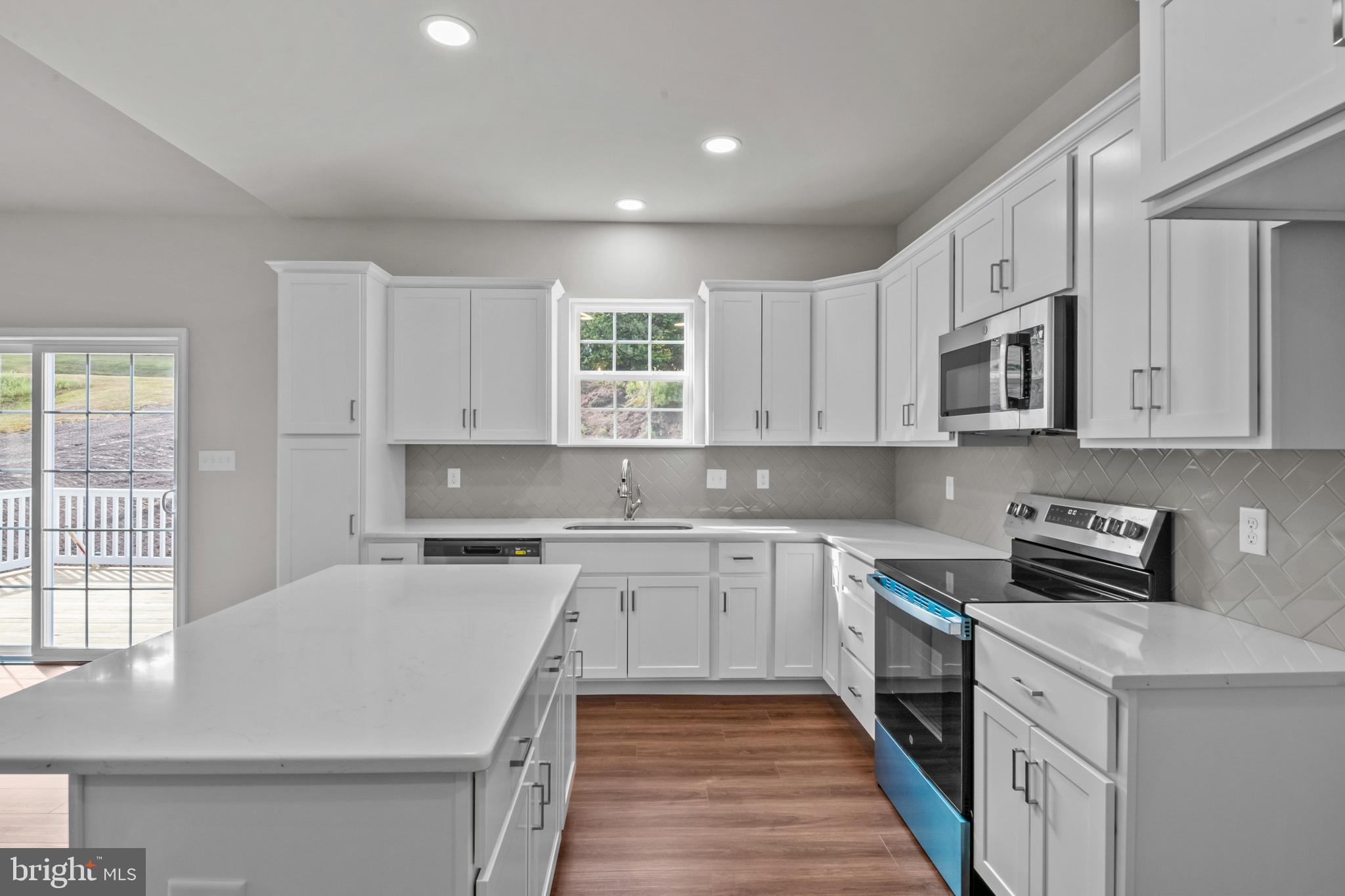 8 Country Club Road Ashland, PA 17921 - Photo 5 of 18 a kitchen with a sink stove and microwave