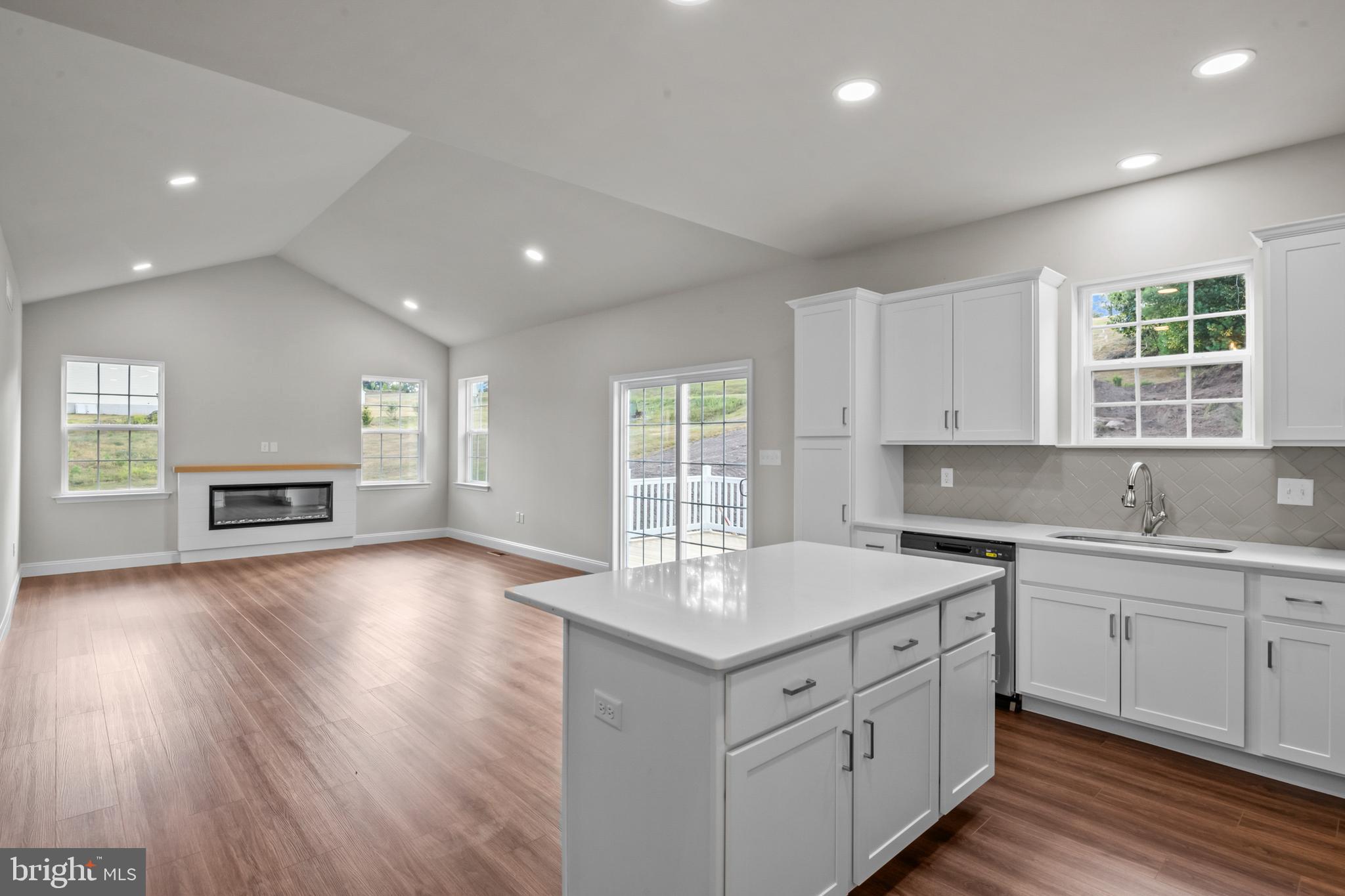 8 Country Club Road Ashland, PA 17921 - Photo 6 of 18 a kitchen with sink cabinets and wooden floor