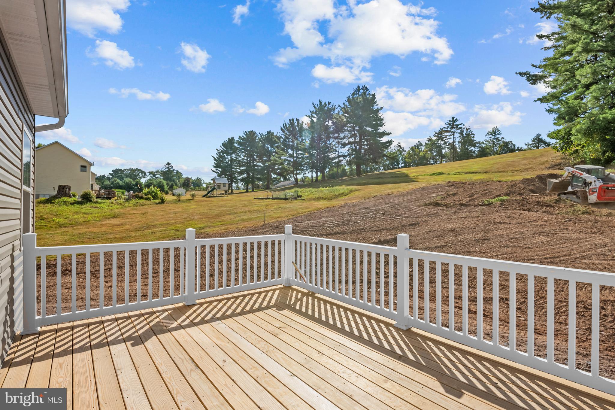 8 Country Club Road Ashland, PA 17921 - Photo 10 of 18 a view of a wooden deck with sunset view