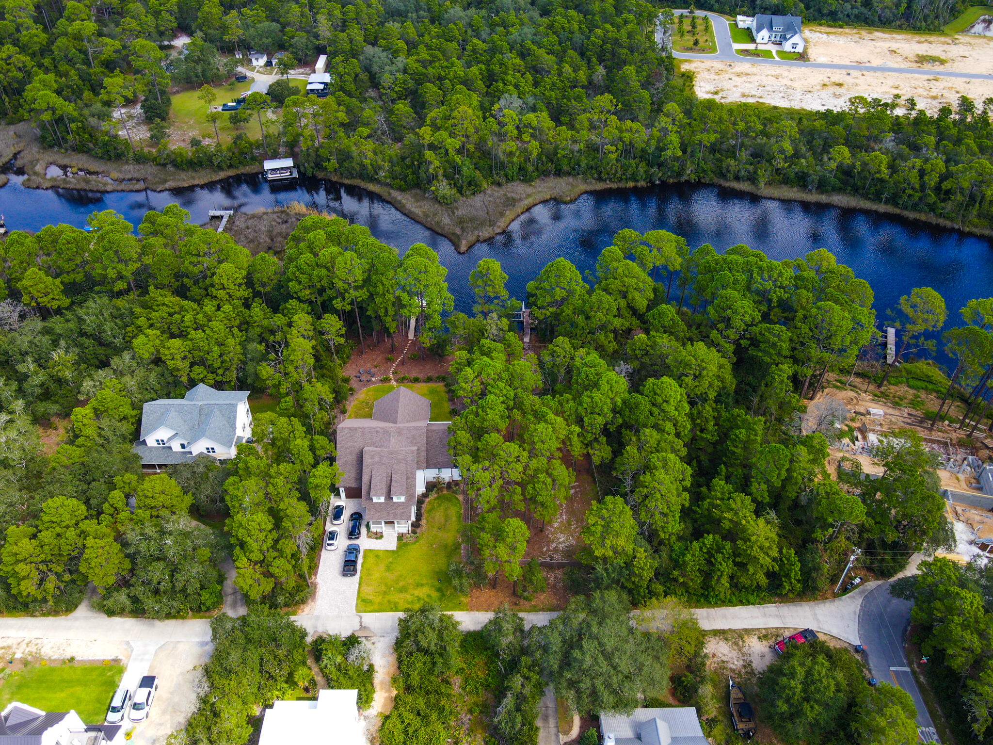 898 North Walton Lakeshore Drive Inlet Beach, FL 32461 - Photo 11 of 13 an aerial view of a house with a garden and swimming pool