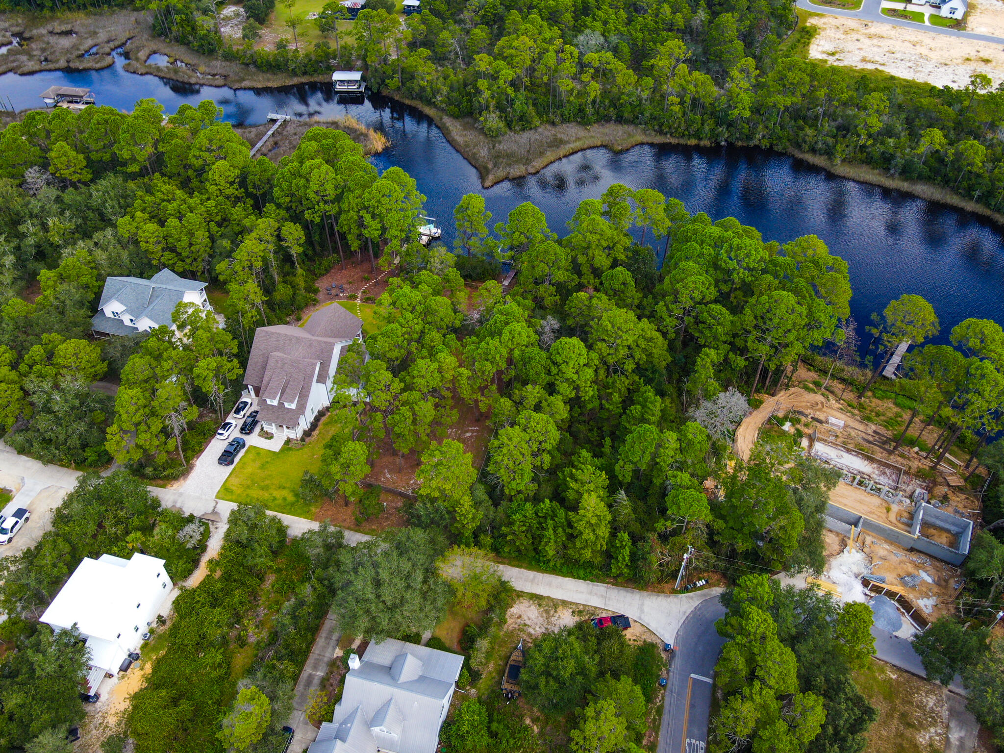 898 North Walton Lakeshore Drive Inlet Beach, FL 32461 - Photo 12 of 13 an aerial view of a house with a yard and outdoor seating