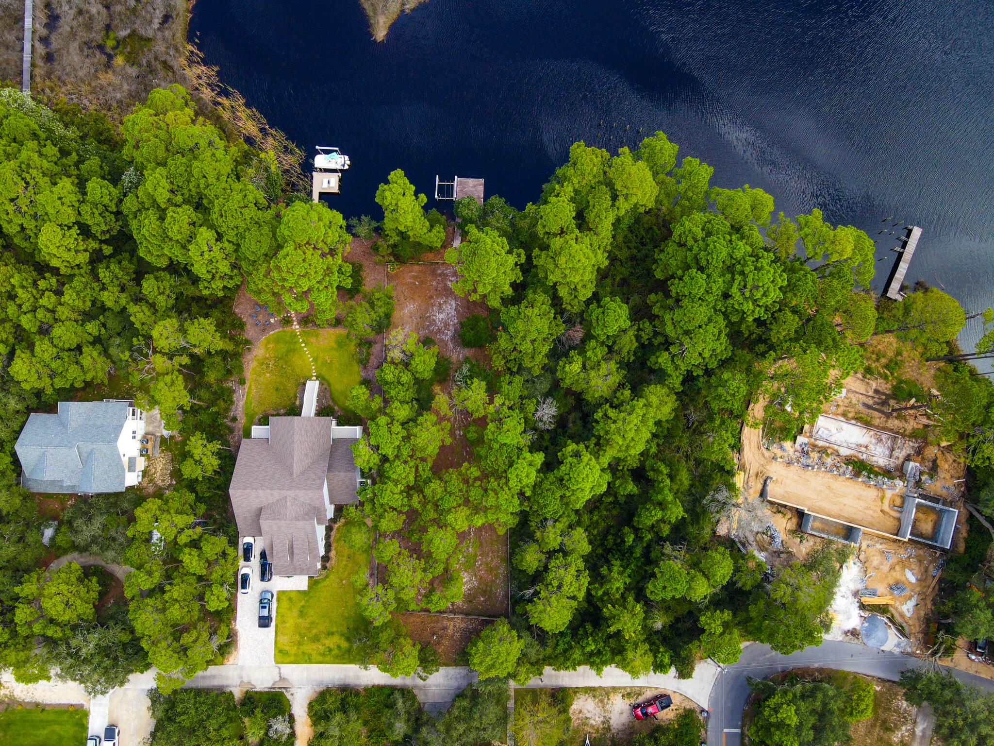 898 North Walton Lakeshore Drive Inlet Beach, FL 32461 - Photo 13 of 13 a backyard of a house with lots of green space