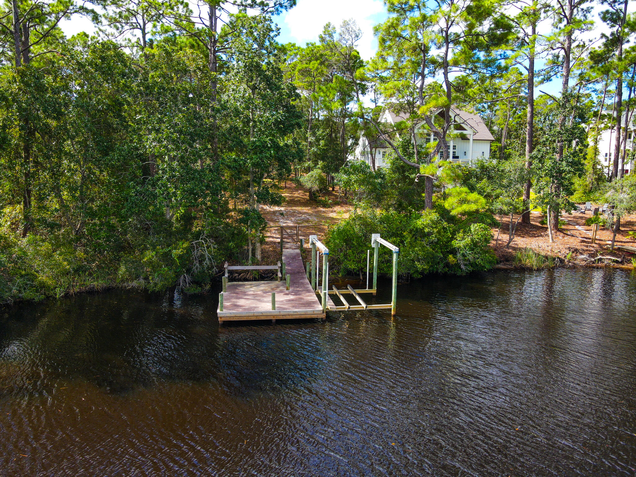 898 North Walton Lakeshore Drive Inlet Beach, FL 32461 - Photo 2 of 13 a view of a lake with boats and trees