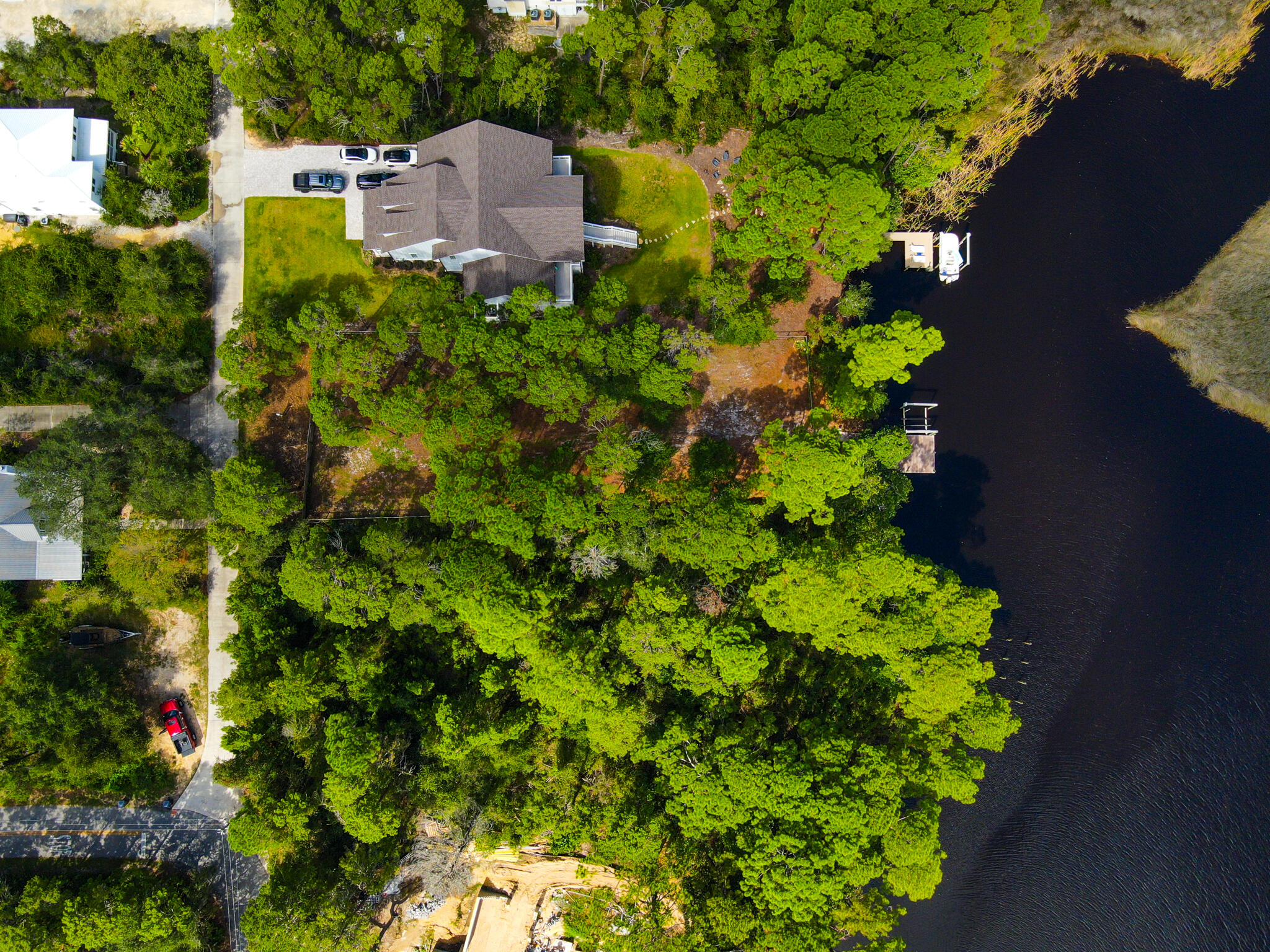898 North Walton Lakeshore Drive Inlet Beach, FL 32461 - Photo 8 of 13 an aerial view of a house with a yard and garden space