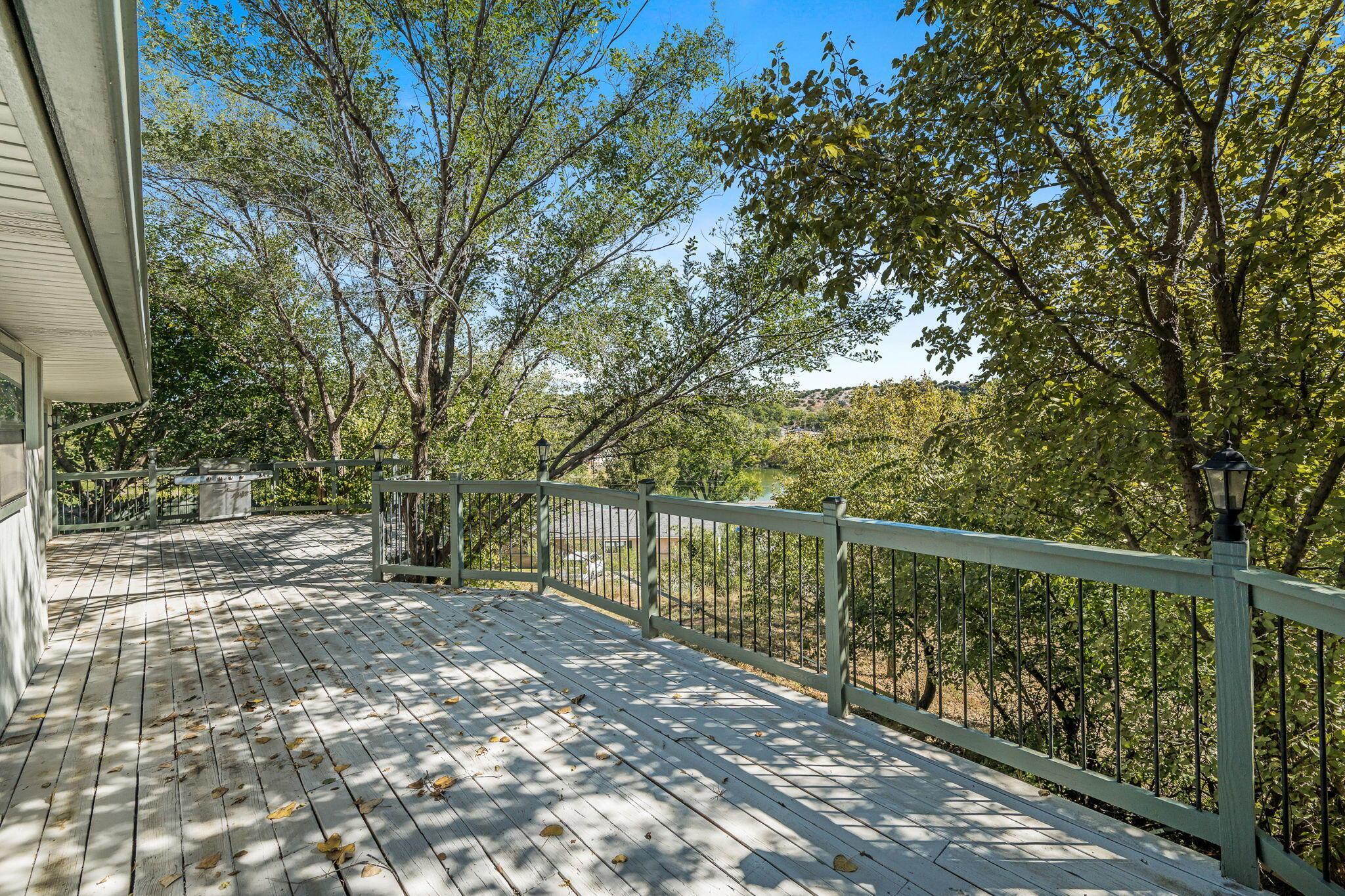 101 Mathis Drive Amarillo, TX 79118 - Photo 11 of 36 a view of a yard with large trees