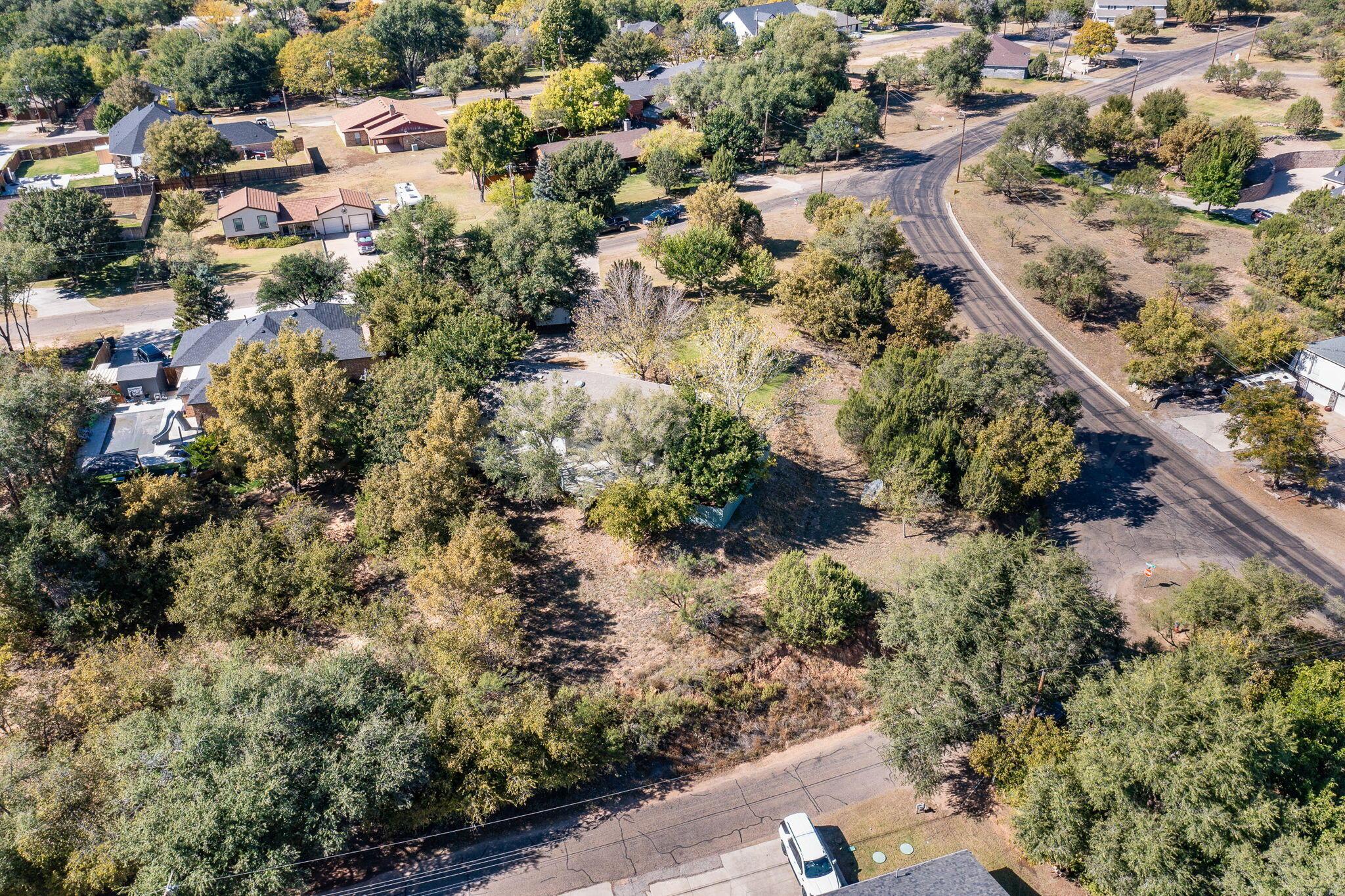 101 Mathis Drive Amarillo, TX 79118 - Photo 31 of 36 an aerial view of a house with a yard