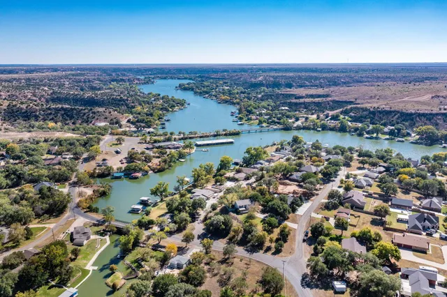 an aerial view of a residential houses and city view