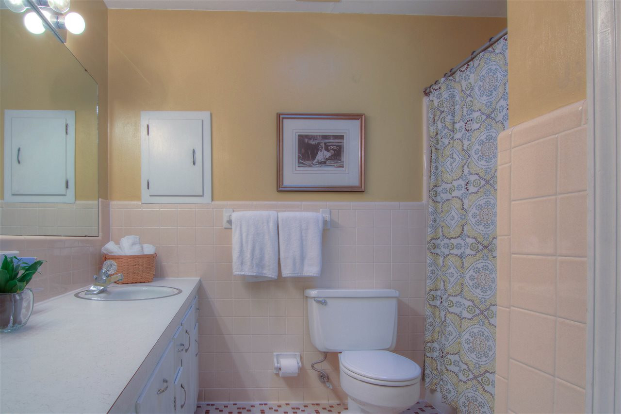 4804 Poland Place Raleigh, NC 27609 - Photo 13 of 25 Oversized bathroom with double sinks, large linen closet, ceramic tile bath, fresh grout and paint! Hall Bath