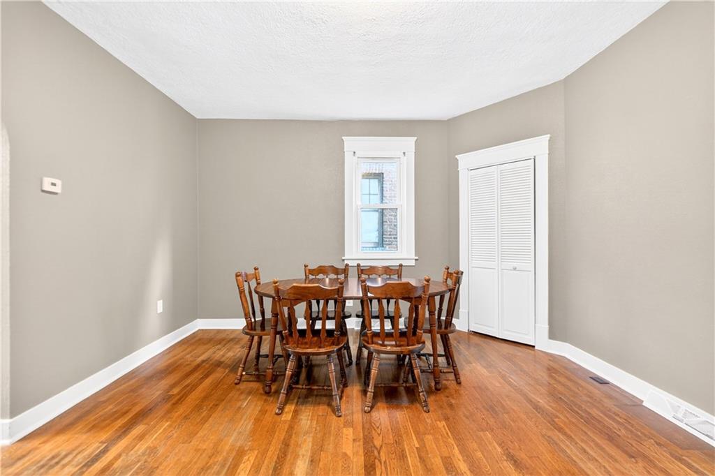554 North Elm Street Butler, PA 16001 - Photo 12 of 31 a view of a dining room with furniture and wooden floor