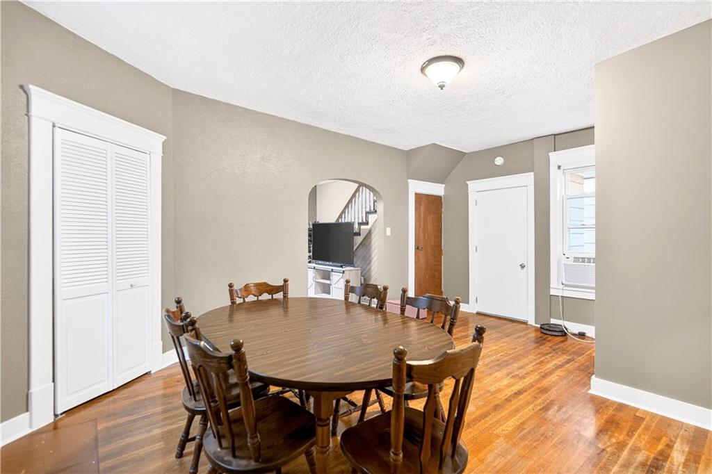 554 North Elm Street Butler, PA 16001 - Photo 13 of 31 a view of a dining room with furniture and wooden floor