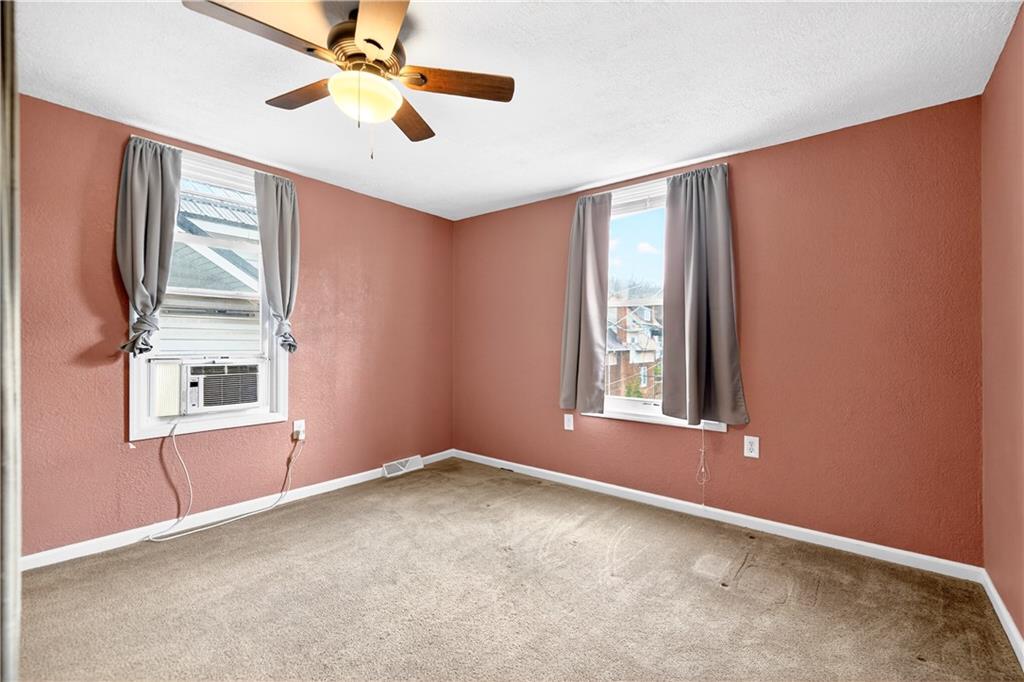 554 North Elm Street Butler, PA 16001 - Photo 18 of 31 an empty room with windows and fan