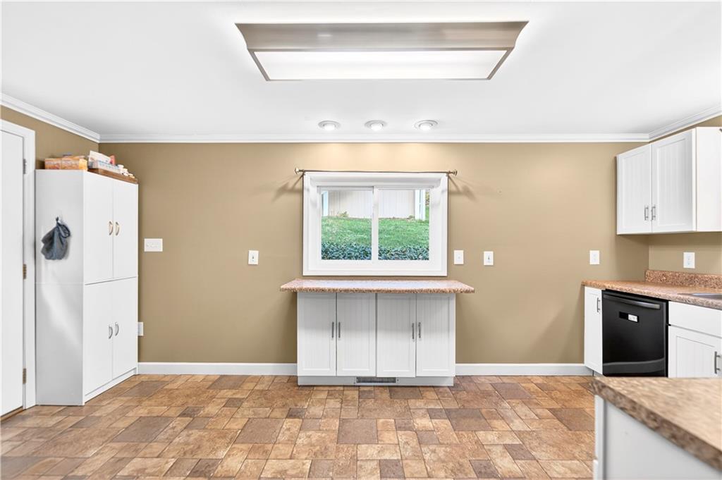 554 North Elm Street Butler, PA 16001 - Photo 7 of 31 a view of a kitchen with a sink and a window