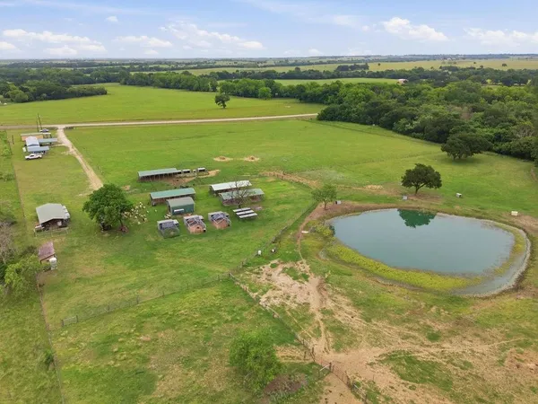 a view of a golf course with a big yard