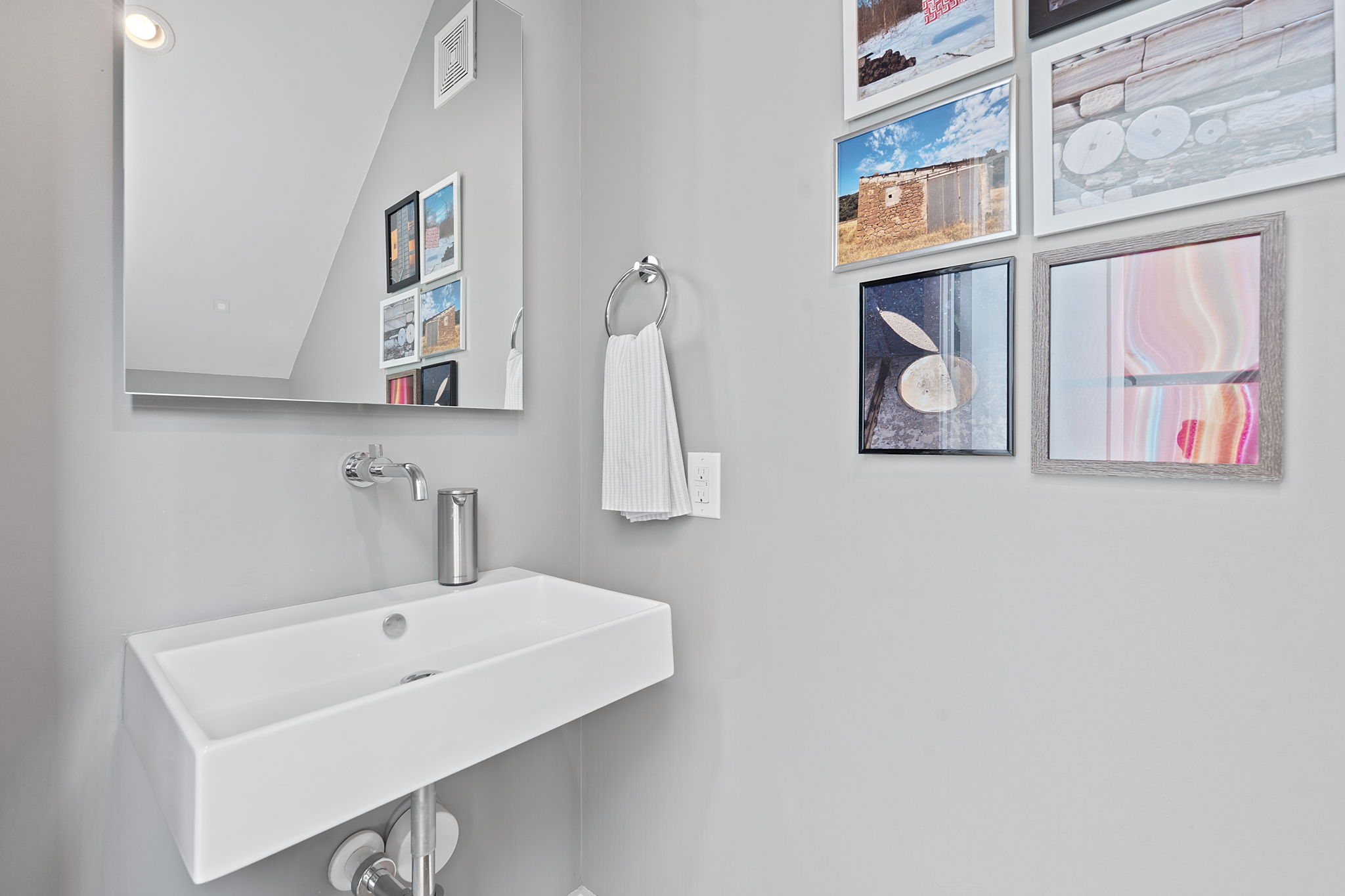 1605 Chelsea Lane, Unit 1 Austin, TX 78704 - Photo 11 of 38 Bathroom featuring a sink and lofted ceiling
