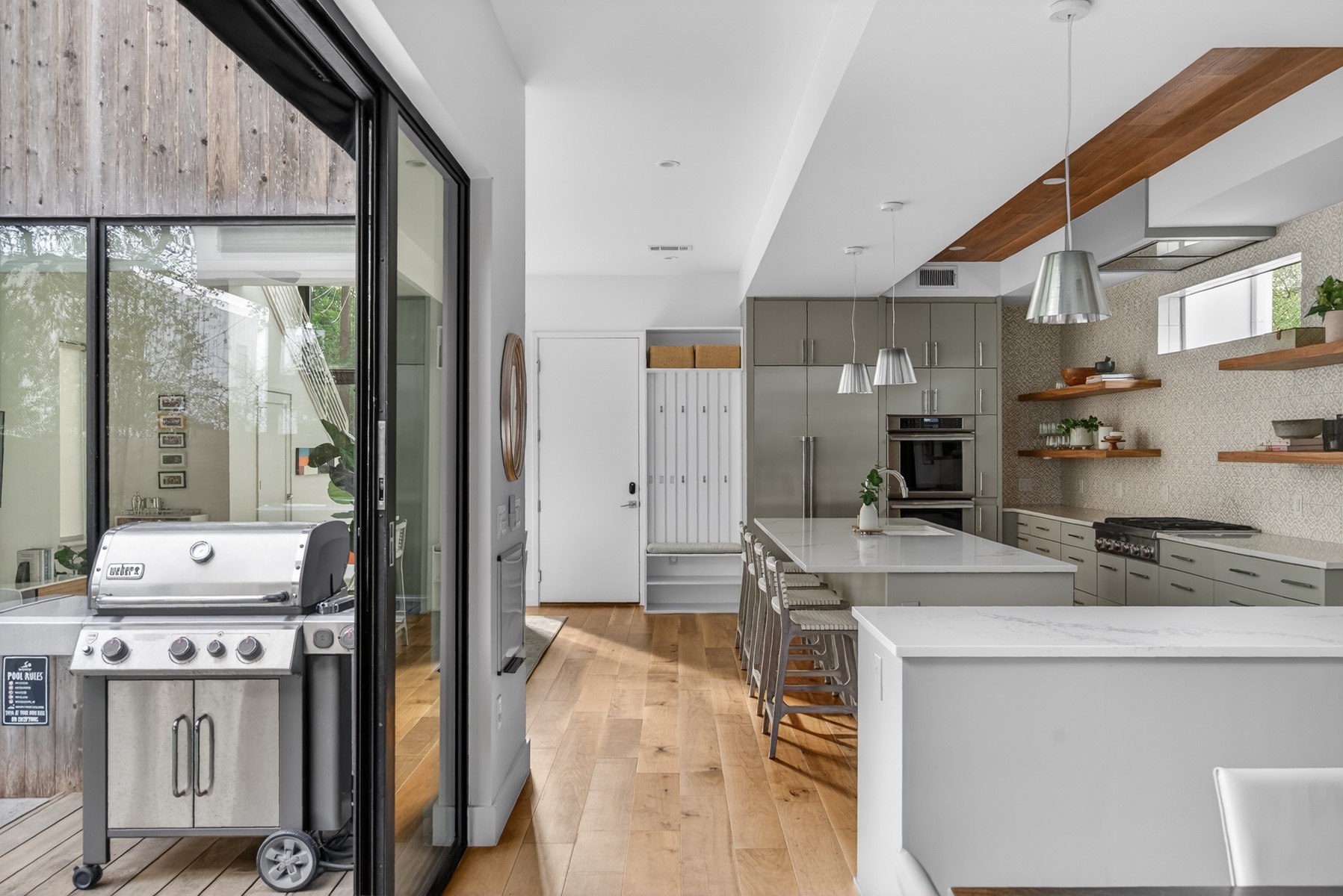 1605 Chelsea Lane, Unit 1 Austin, TX 78704 - Photo 13 of 39 a kitchen with a sink stove and cabinets